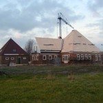 Stolpboerderij in bouwfase